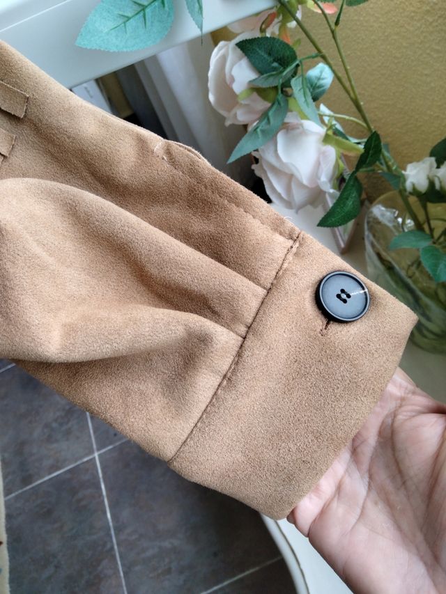 Chaqueta con flecos beige