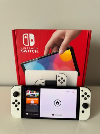 Nintendo Switch OLED + funda + tarjeta de 128gb