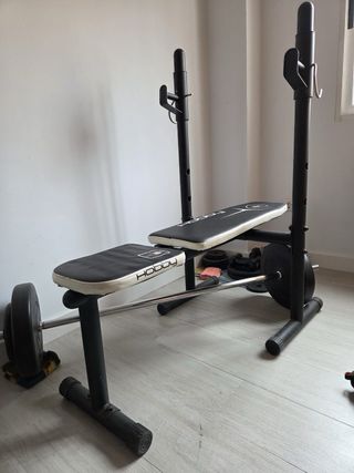 Banco de pesas Decathlon con barra y discos