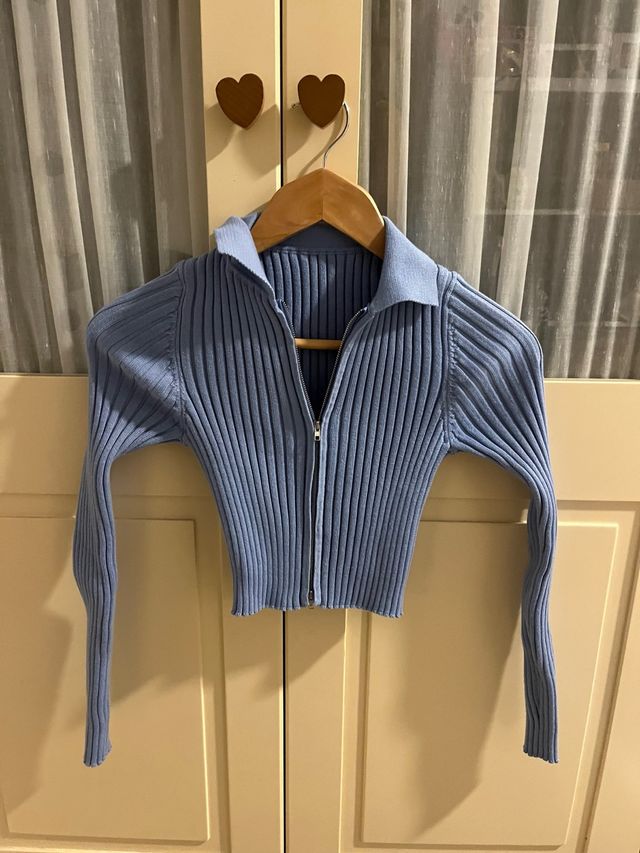 Jersey azul de punto con cremallera