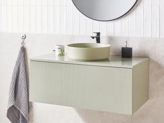 Mueble cajonero y lavabo encimera cerámico.