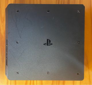 PS4 Slim 500GB + mando + 6 juegos – funciona bien