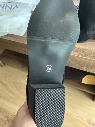 Botas altas negras con hebillas