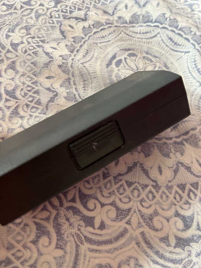 Armónica plateada con estuche