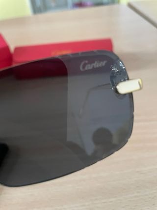 Occhiali da sole Cartier neri e oro