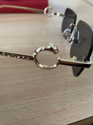 Occhiali da sole Cartier neri e oro