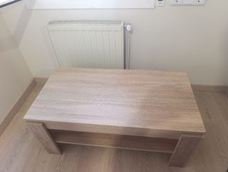 Mesa de comedor elevable.
