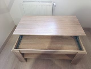 Mesa de comedor elevable.