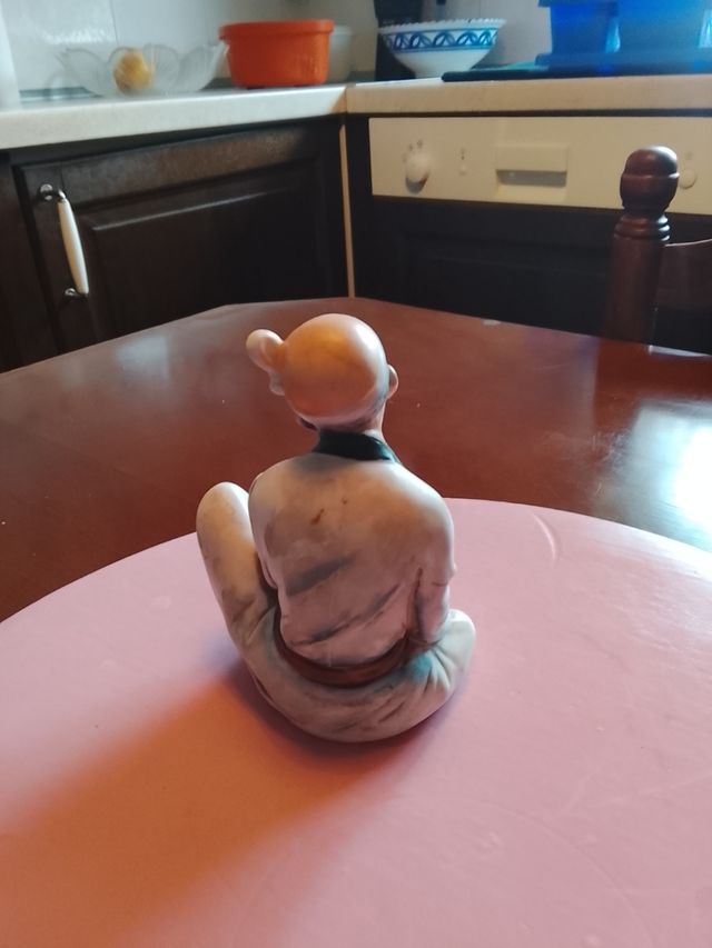 Figura de pescador de cerámica