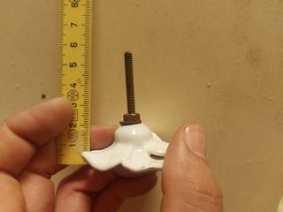 7 pomelli a forma di fiore in ceramica bianca