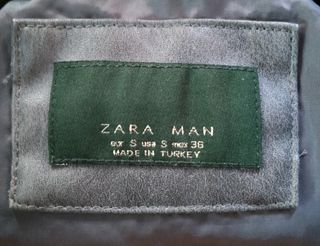 Chaqueta efecto piel hombre gris