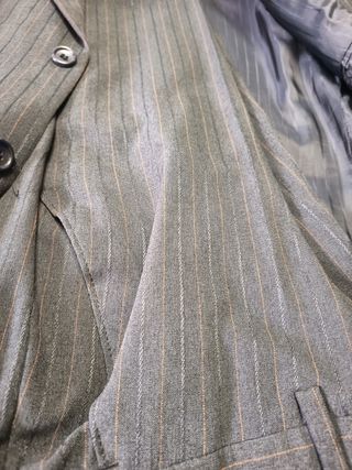 Traje chaqueta y pantalón gris