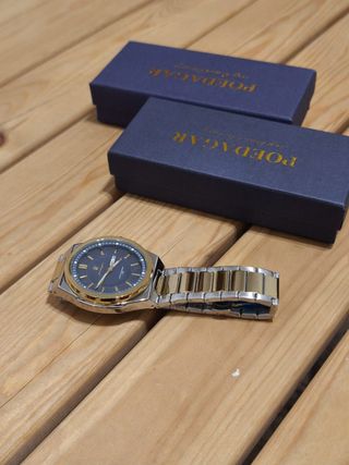 Reloj Pordajar Hombre Oro y Plata