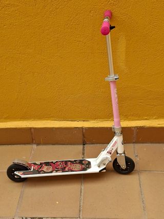 Monopatín Oxelo infantil rosa y blanco