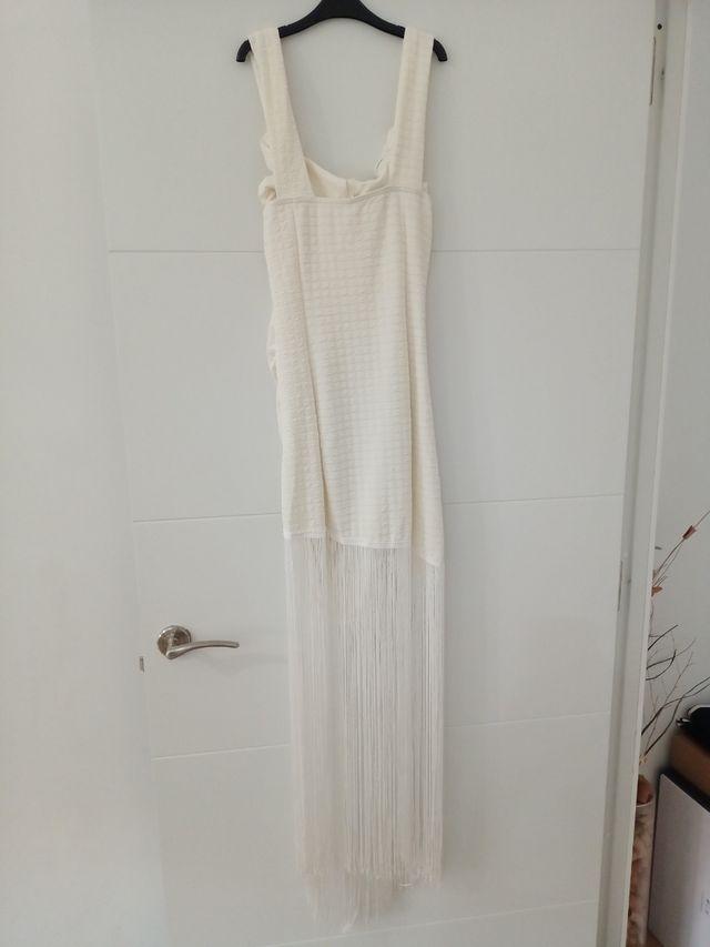 Vestido blanco con flecos