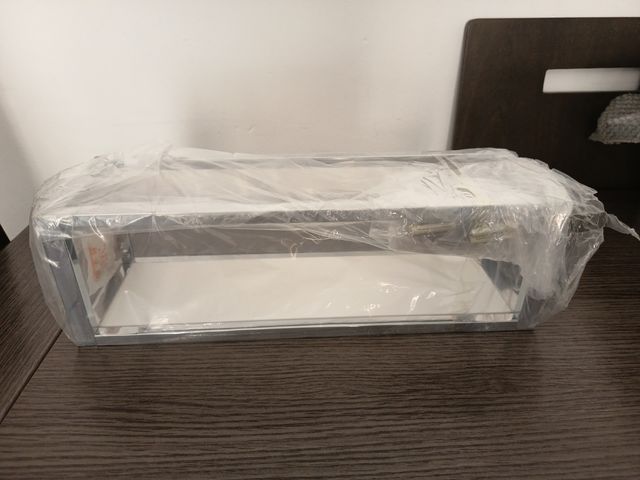 Estante de baño plateado