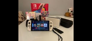 Nintendo Switch OLED Blanca + 2 Juegos + Funda
