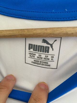 Camiseta deportiva Puma blanca y azul