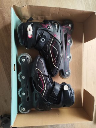 Patines Oxelo negros con detalles rosas