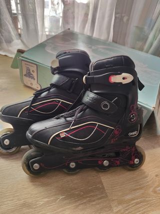 Patines Oxelo negros con detalles rosas