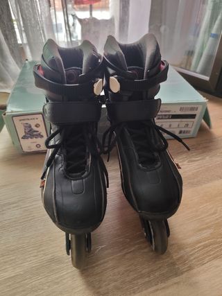 Patines Oxelo negros con detalles rosas
