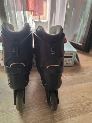 Patines Oxelo negros con detalles rosas