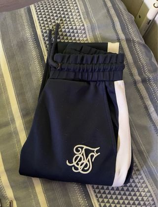 Pantalón de chándal Sik Silk azul ajustado