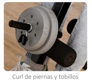 Press de banca HOMCOM con pesas.