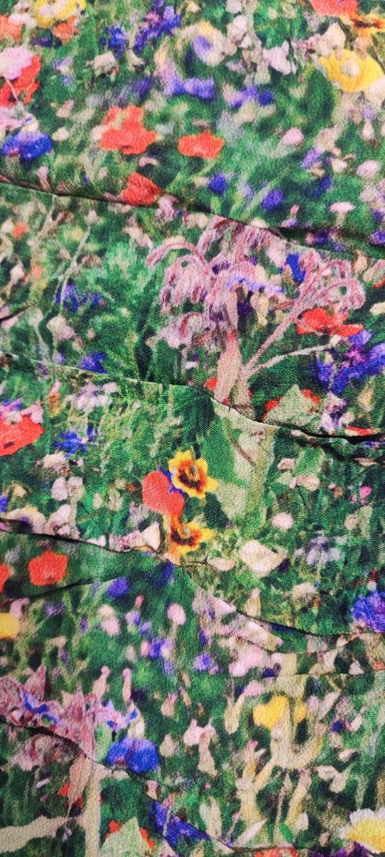 Blusa verde con estampado floral