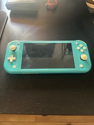 Nintendo Switch Lite Verde agua con funda