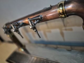 Grifo de cerveza de cobre y latón