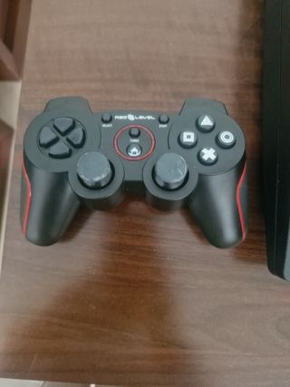 Consola PS3 con 2 mandos y 2 juegos
