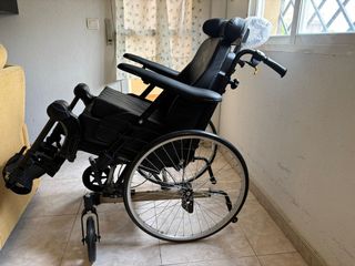 Silla basculante reclinable con reposapiés