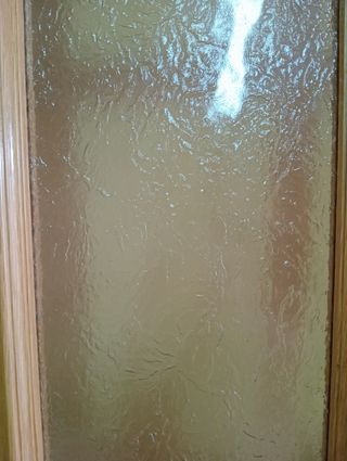 Puerta doble de madera pino para salón con cristal