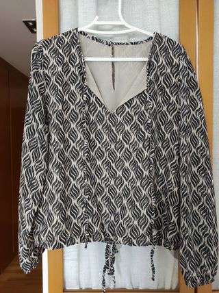 Blusa estampada manga larga