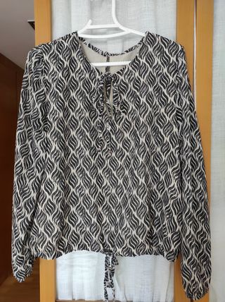 Blusa estampada manga larga