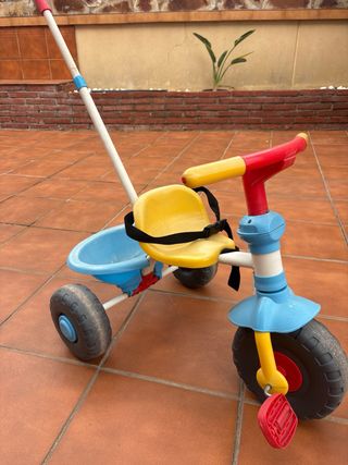 Triciclo infantil con empujador