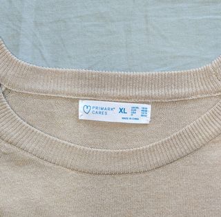 Jersey de rayas beige y negro talla XL