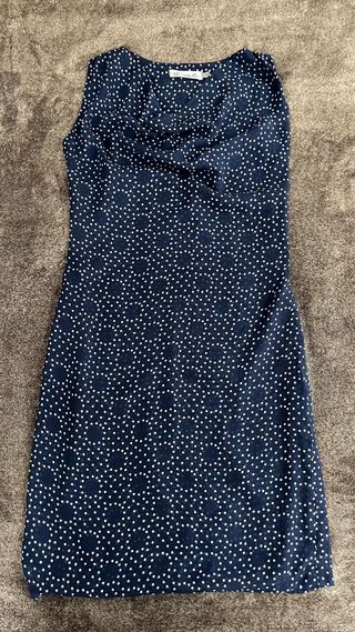 Summer dress made of thin fabric with a belt.