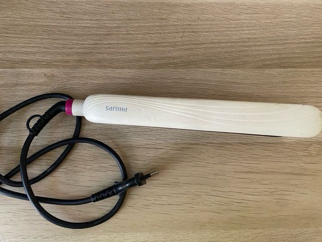 Plancha de pelo blanca y rosa