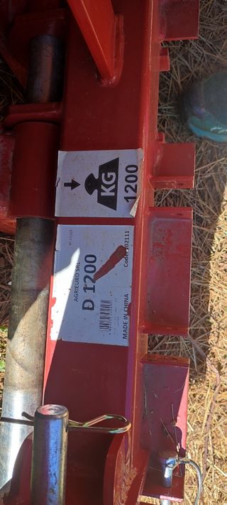 Alzador para tractor rojo