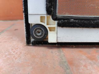 Mosquitera corredera blanca