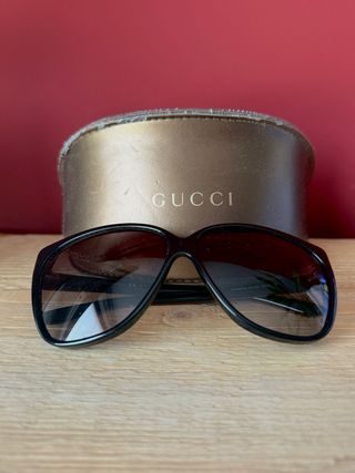Gafas de sol Gucci negras y marrones