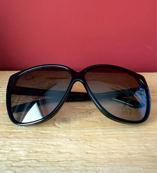 Gafas de sol Gucci negras y marrones