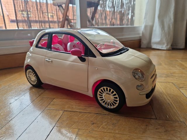Coche de Barbie rosa y blanco