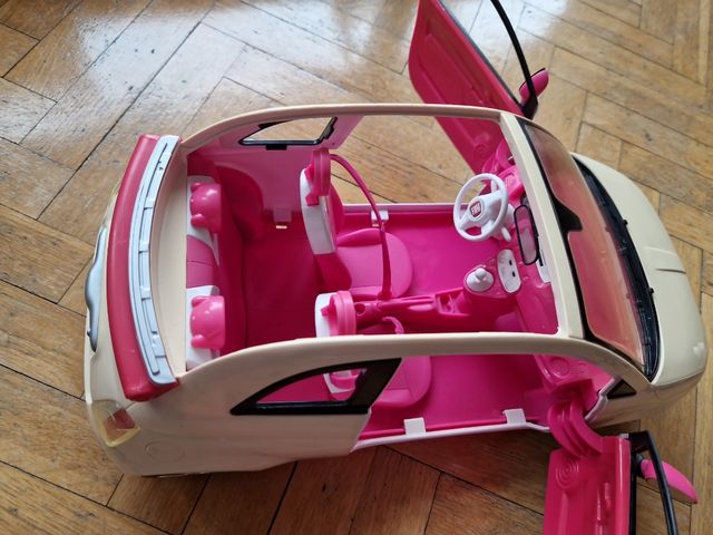 Coche de Barbie rosa y blanco