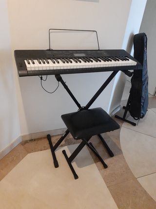 Teclado Casio CTK-320 con soporte y banqueta