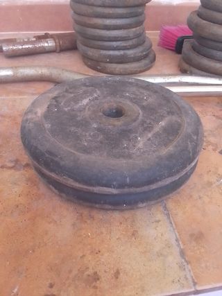 Pesas y barras de gimnasio