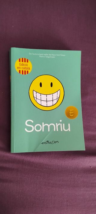 Libro SOMRIU en Catalan.