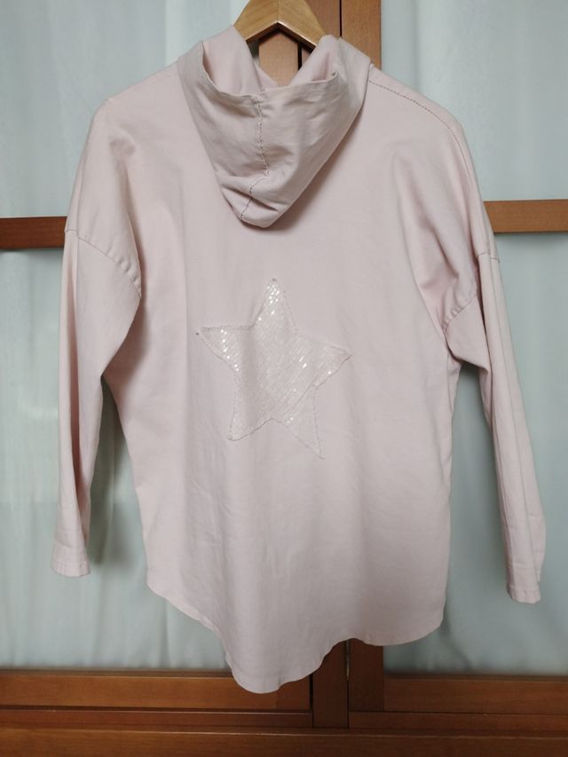 Chaqueta rosa con estrella de lentejuelas
